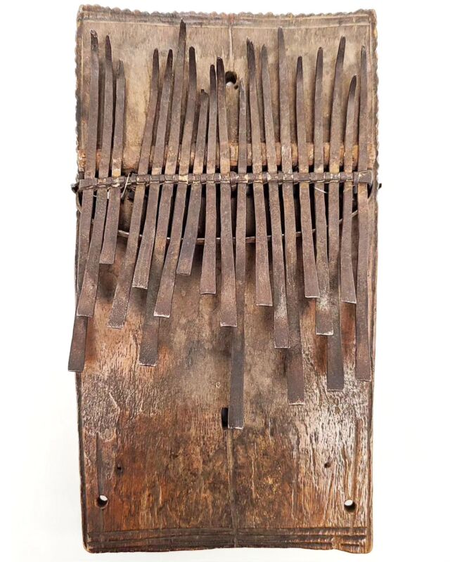 Our April Artifact of the Month is a Kuba thumb piano from our exhibit "Beyond Drumming: African Musical Instruments." You'll also be able to play thumb pianos at our upcoming African Music Open House on April 13, 1-4pm.

Thumb pianos are most commonly known as mbira, a name that comes from the Shona language of Zimbabwe. They use a resonating chamber, such as a wooden box, stiffened leather, or even a large gourd, to amplify their sound. They are playing by holding the instrument with both hands, so your fingers are underneath, and your thumbs are on top to pluck the tines.

The earliest evidence for mbiras goes back to approximately 1000 BCE, when a plucked instrument with bamboo or wood tines was developed on the west coast of Africa. Then, around 1300 years ago, instruments with metal tines were invented in Southeast Africa. This instrument soon spread throughout the continent, acquiring many different forms and names. The kalimba, a westernized version of the mbira, has been popularized around the world, most notably by the band Earth, Wind and Fire. In 2020, the making and playing of the mbira in Malawi and Zimbabwe was added to the UNSECO Representative List of the Intangible Cultural Heritage of Humanity.

In addition to being played for the enjoyment of the music, thumb pianos can be played for ceremonial occasions, like weddings and funerals, or for religious purposes. For some, playing the mbira can create a pathway to the spiritual world, connecting to ancestors to seek their advice. The pleasing sound of the music has the ability to attract the ancestor spirits to the world of the living.

This thumb piano comes from the Kuba Kingdom in the Democratic Republic of the Congo, where it is known as a sanza.  Thumb pianos in the Kuba culture are played for both the living and the ancestors. While some sanza are ornately decorated, this example is relatively simple. This instrument was collected from the Kuba people by missionary Ida Black in 1939.

Curatorial assistance for this post was provided by Brighid Biehl (’24) and Seth Neitlich (’26).

#lammuseum #africanmusic #africaninstruments #thumbpiano #mbira #sanza #kuba #drc
