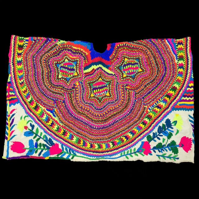 Our June #ArtifactOfTheMonth is a beautiful embroidered Maya huipil. A huipil is a rectangular blouse that makes up part of a Maya women’s traditional outfit. The word huipil comes from the Nahuatl (Aztec) language, and blouses in this style have been worn by indigenous Mesoamerican women for more than one thousand years.

This huipil is from the Maya town of San Mateo Ixtatán in the department of Huehuetenango, Guatemala. The town is in the northwestern part of the county, high in the Cuchumantanes Mountains. The people of San Mateo are often referred to as Chuj Maya, based on the language they speak, but they prefer to identify themselves based on the name of their municipality, in this case as ajSan Matéyo.

The women of San Mateo Ixtatán make and wear huipiles that are different from all others in Guatemala and immediately identifiable. Since at least the beginning of the 20th century, the women have made their voluminous huipiles by embroidering a double layer of commercially produced white cotton cloth, rather than weaving the garment on a backstrap loom. The women heavily embroider the blouse on both sides so that it is completely reversible, with the same design inside and out. The double-sided embroidery makes the huipil very heavy and appropriate for the cool climate of the high mountain town. Huipiles from San Mateo are also longer than those found elsewhere in the country. They are worn over wrapped skirts, rather than tucked in. Because of the intricate hand-stitched designs, a huipil like this one can take many months to complete.

In addition to being beautiful pieces of clothing, huipiles also express the wearer’s ethnic identity, often indicating a specific community of origin, as this one does. The designs can reflect aspects of the Maya beliefs and connections to the natural world. In this piece, the stars may connect to the centrality of astrology in the Maya worldview, and the zigzags likely represent the mountains surrounding their home.

#lammuseum #wakethearts #Maya #huipil #textile #Guatemala